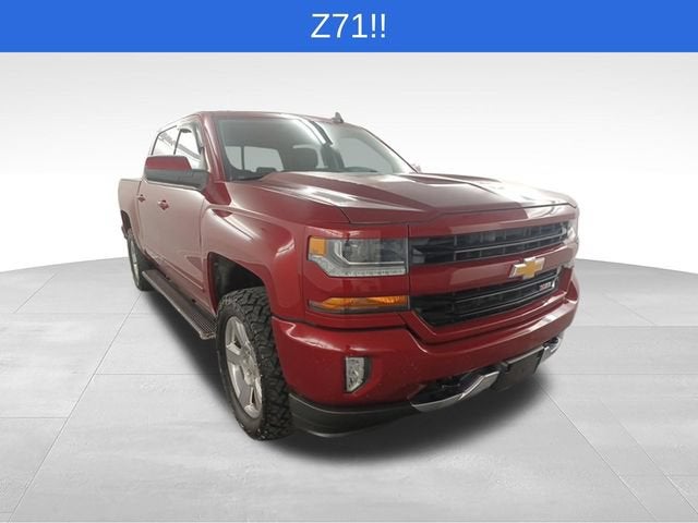 2018 Chevrolet Silverado 1500 LT in Cajun Red Tintcoat — front three-quarter view