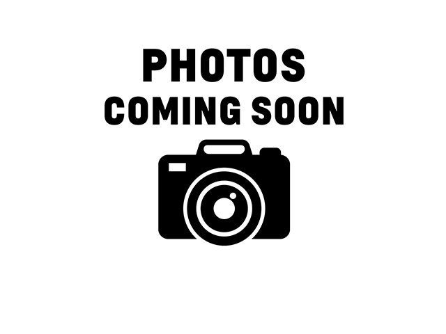 2026 GMC Yukon Denali Ultimate in Glacier White Tricoat — front three-quarter view